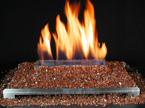 Crushed fire glass in a ventless gas log fireplace has a contemporary look for modern designs by not pretending to be a wood burning fireplace by displaying a striking alternative fire effect.