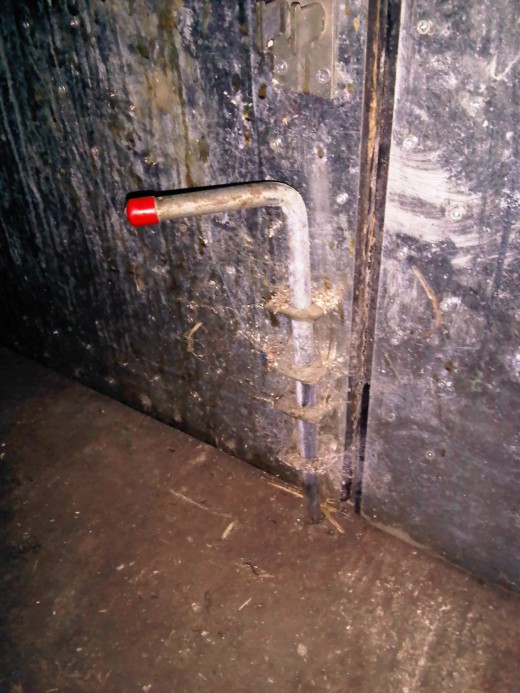 Internal bolt on the bottom of a door.