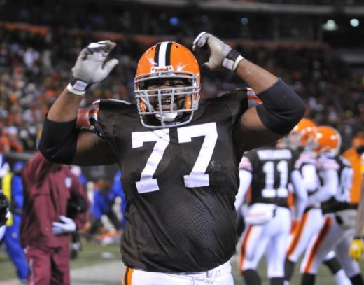 Floyd Womack celebrates a touchdown in an NFL football game against the Pittsburgh Steelers Thursday, Dec. 10, 2009, in Cleveland. (AP Photo/David Richard)