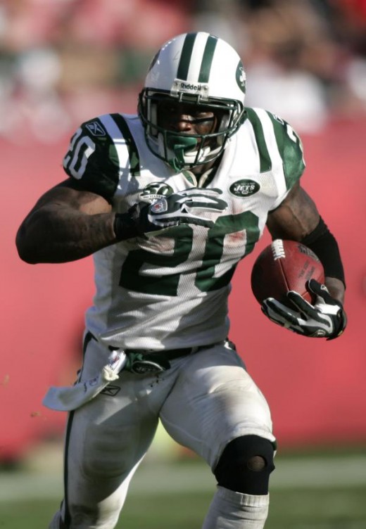 New York Jets running back Thomas Jones (20) runs for his second touchdown of the day against the Tampa Bay Buccaneers during the fourth quarter of an NFL football game Sunday, Dec. 13, 2009, in Tampa, Fla. (AP Photo/Brian Blanco)