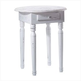 White round end table with antique finish