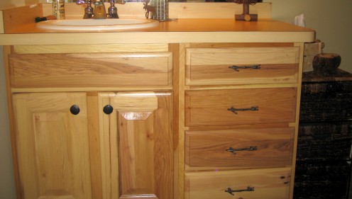 Hickory cabinets for rustic decor.
