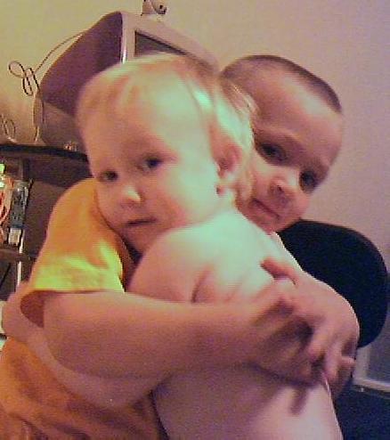 The world could use a few more hugs...  This is Marc and Travis a few years ago.