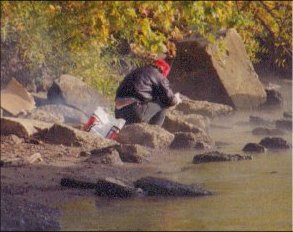 Homeless man beside Ohio River in Cincinnati.
