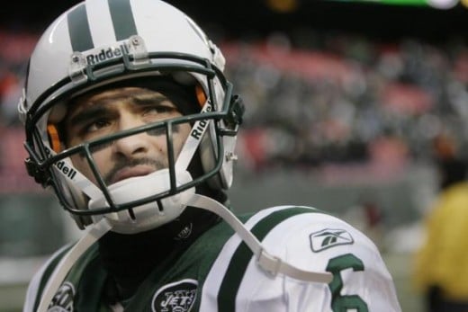 New York Jets' Mark Sanchez walks off the field after the Jets' 10-7 loss to the Atlanta Falcons in an NFL football game Sunday, Dec. 20, 2009, in East Rutherford, N.J. (AP Photo/Seth We