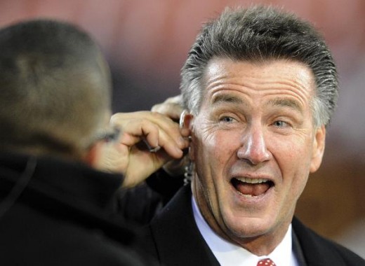 The Washington Redskins' new general manager, Bruce Allen, prepares for a television interview before the Redskins' NFL football game against the New York Giants, Monday, Dec. 21, 2009, in Landover, Md. (AP Photo/Nick Wass)