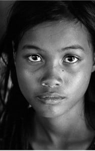  A Nick Rain image. A young Cambodian girl from a rural villiage who is at high risk of being trafficked.  