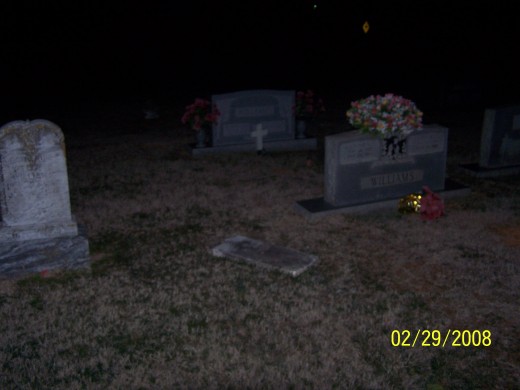 In this photo you can not see the cross glowing in the photo but it does glow brightly at night. It glows with a bright white light and appears to float. 