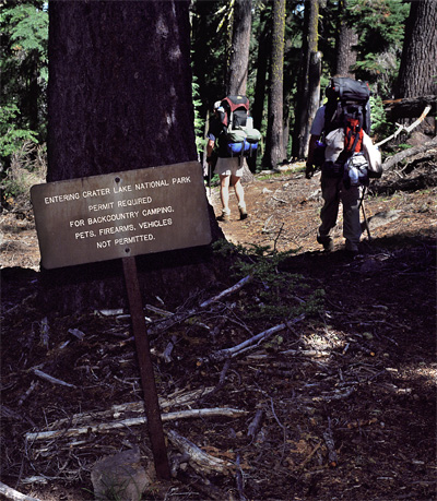 Sign designating the boundary into Crater Lake National Park.