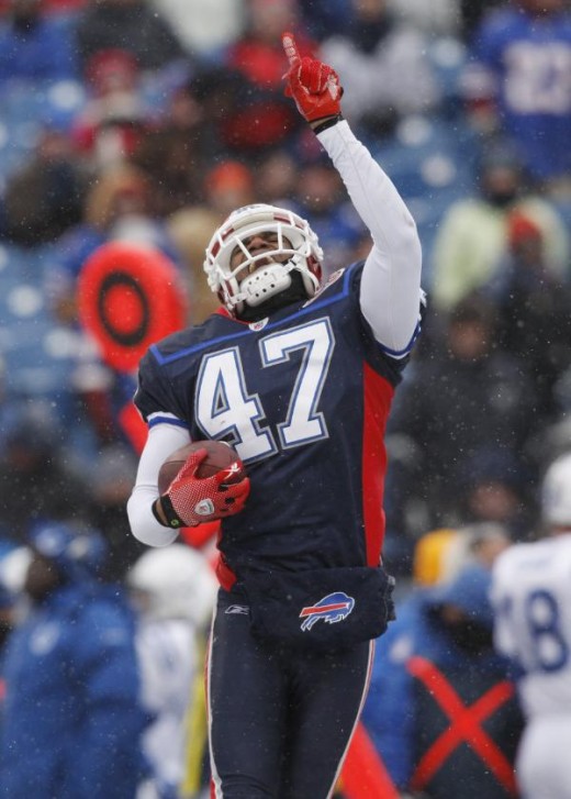 Buffalo Bills defender Cary Harris reacts to his interception against the Indianapolis Colts during the first half of an NFL football game in Orchard Park, N.Y., on Sunday, Jan. 3, 2010. (AP Photo/Mike Groll)