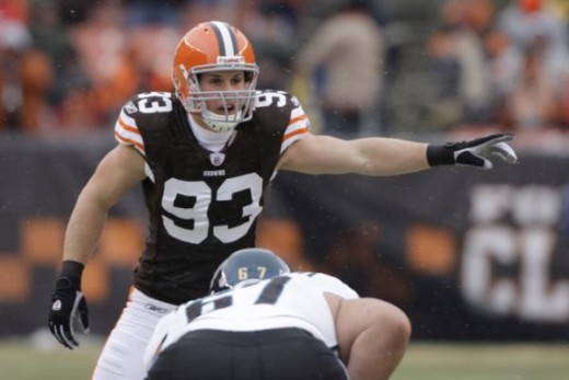 # Cleveland Browns linebacker Jason Trusnik (93) calls a play at the line over Jacksonville Jaguars guard Vince Manuwai (67) during their NFL football game Sunday, Jan. 3, 2010, in Cleveland. (AP Photo/Amy Sancetta) 