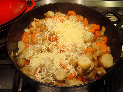 When the roots are soft, add the cheese