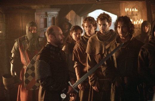 Chris Johnston and the professor's team encounter Lord Oliver who is distrustful of strangers. Scene from the movie "Timeline".