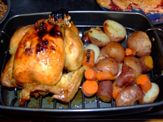 crackly skin...succulent chicken...rich roast potatoes...delicious sweet potatoe and carrots...mmmm!