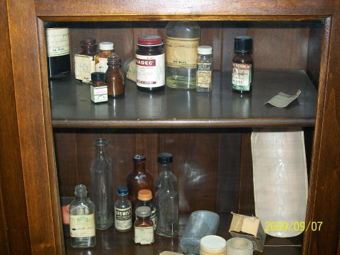 Pictured on the right side area is more casting material among the variety of medicines and bottles.