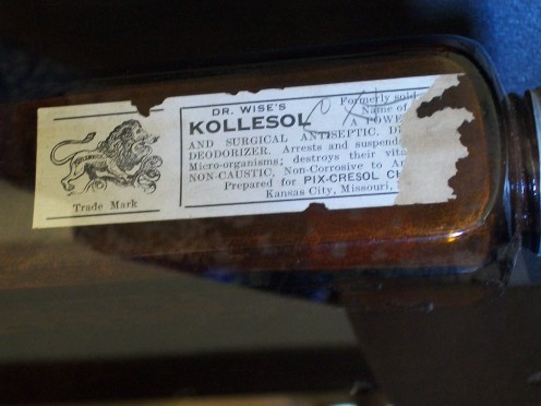 Kollesol, a surgical antiseptic containing 'creosote' portion. There were none/few antibiotics as we know them today, then available.