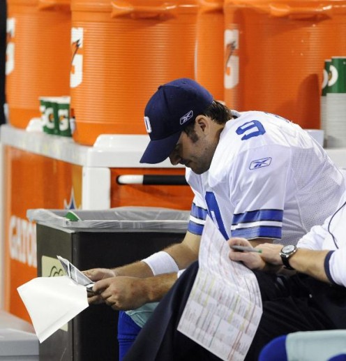Dallas Cowboys' Tony Romo is seen on the bench during the second half of an NFL divisional playoff football game against the Minnesota Vikings Sunday, Jan. 17, 2010, in Minneapolis. (AP Photo/Jim Mone)
