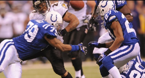 Colts DE Raheem Brock forces a fumble out of the hands of Ray Rice in the fourth quarter. (Matt Kryger/The Indianapolis Coplts)