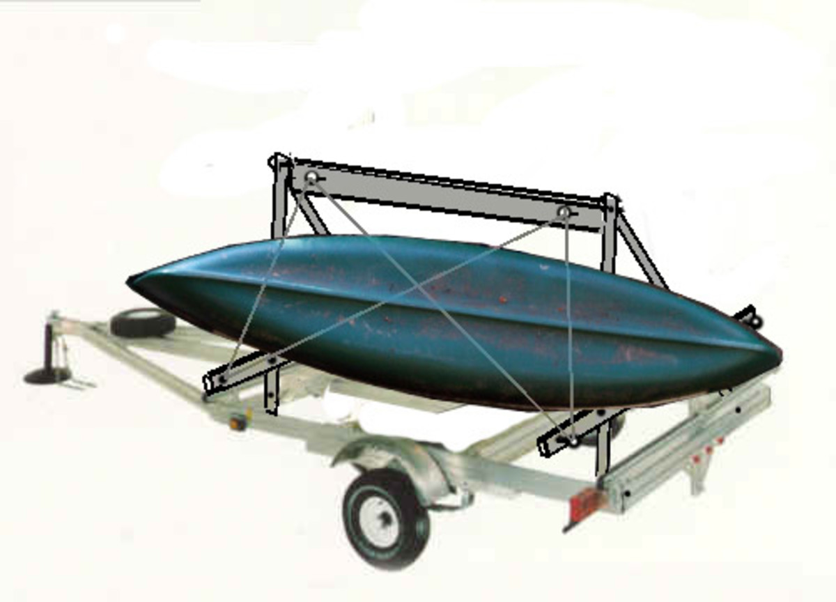 The A-Frame trailer carries 2 to 3 canoes or kayaks with the outside ones turned up on one side.