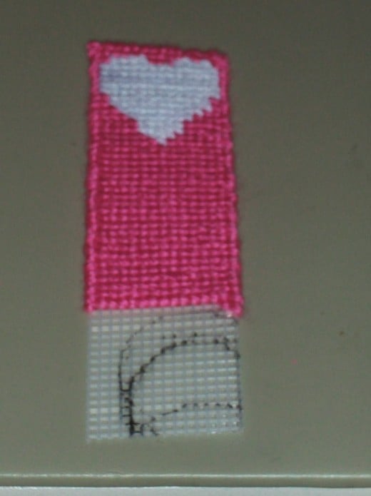 As I sew on the yarn it is very rewarding to know I am creating this bookmark with my hands.
