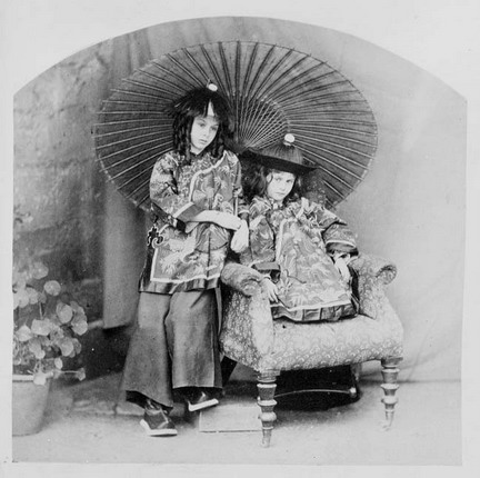 Alice and Sister Lorina dressed as Chinamen.  Photo taken by Charles Dodgson, AKA Lewis Carroll