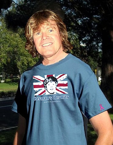 You can get this T-Shirt (as shown modeled by Peter No one) at www.peternoone.com. All proceeds go to breast cancer research.