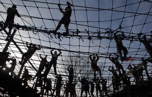 Tough Guy Race includes cross country run followed by assault course.