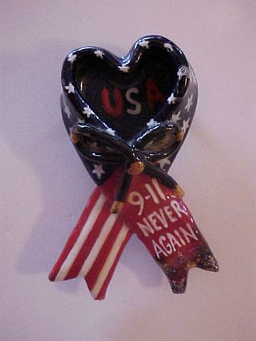 One of my 9/11 pins. this style was donated to the clergy division at the World Trade Towers rubble and they were given to rescuers along with    conseling when they came out of those pits.