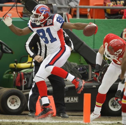 Buffalo Bills wide receiver Terrell Owens (81) gets into the end zone for a touchdown during the first half of an NFL football game against the Kansas City Chiefs, Sunday, Dec. 13, 2009, in Kansas City, Mo. (AP Photo/Orlin Wagner)