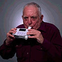 This illustration shows a patient using a spirometer machine