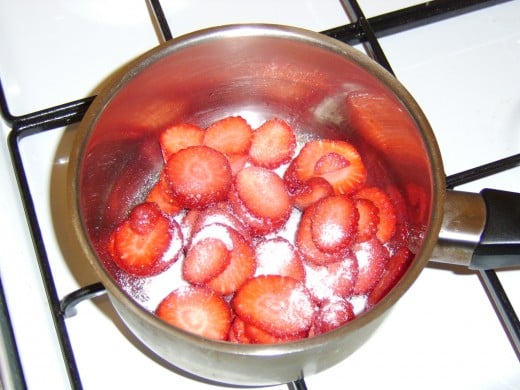 Sliced Strawberries and Caster Sugar in Pot