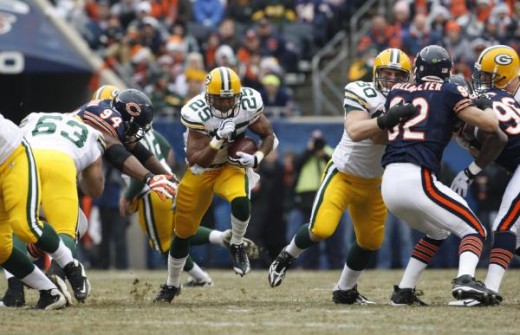 Green Bay Packers running back Ryan Grant (25) heads to the end zone for touchdown against the Chicago Bears during the first half of an NFL football game in Chicago Sunday, Dec. 13, 2009. (AP Photo/Nam Y. Huh)