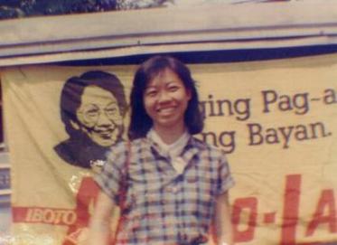 A smiling supporter of the first female President, Corazon C. Aquino