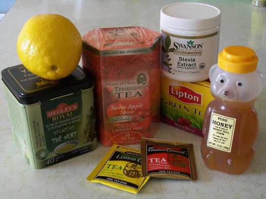 Green tea, as others, has many antioxidant values to add to our day. If you will use lemon, though it is an acidic fruit, the end result cellularly is alkaline, which is healthy.