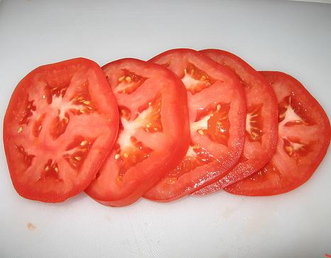 Sliced garden ripened tomatoes are delicious and cleansing to the morning palate. A juicy companion to hot cornbread!
