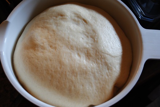 The dough at the end of the second rise will be smooth and appear to have a matte finish.
