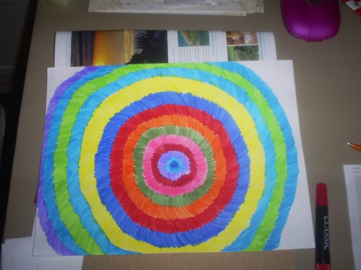 Continue to add color as you reach the edges of the paper.