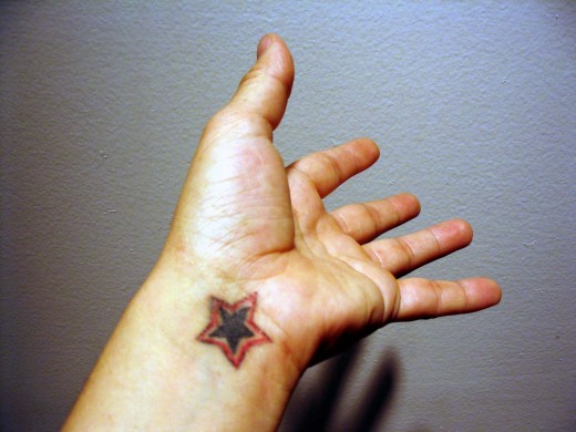 Star Tattoo on a wrist.