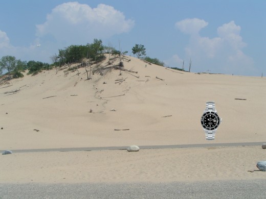 Can you find the Real Authentic Rolex in this photo?