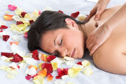 Massaging body with essential oil can lift body, mind and soul.