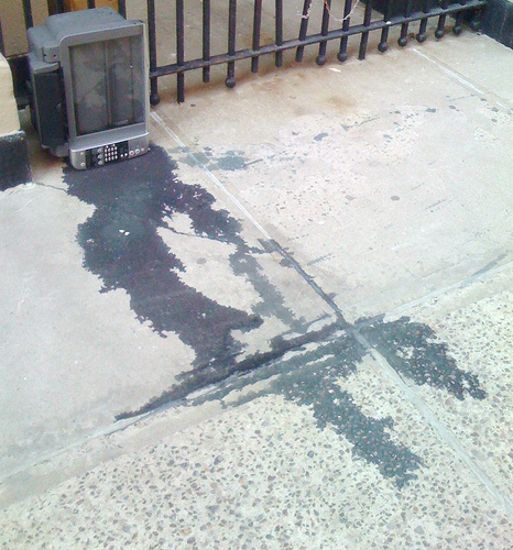 Ink stains on floor.