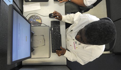 Searching for a job in Long Beach, Calif.  (AP Photo/Chris Carlson)  