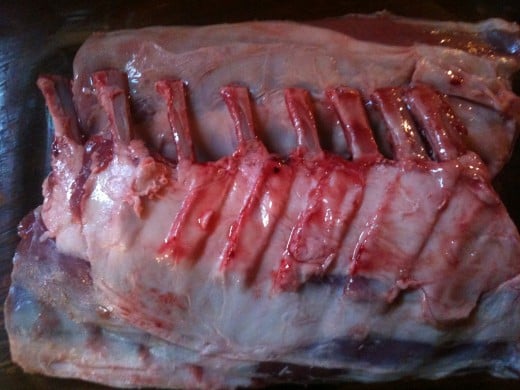 Two average size racks of lamb that have been 'Frenched' - or cleaned by the butcher. 