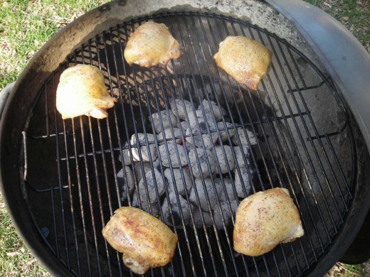 THIGHS PLACED AROUND THE GRILL'S PERIMETER. TIME ELAPSED ABOUT 10 MINUTES