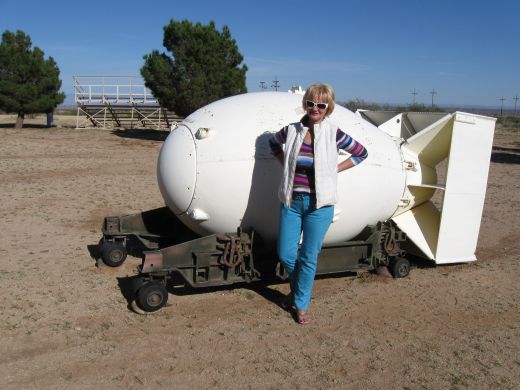 My wife Bella posing next to a model of an Atomic Bomb at the U.S Army White Sands Missile Museum in New Mexico.