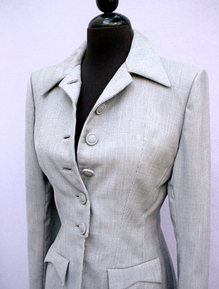 Elegant vintage 1950s Lady Simpson Original grey jacket Lined in grey crepe. Comes with a stash of extra buttons See Posh Vintage for purchasing information.