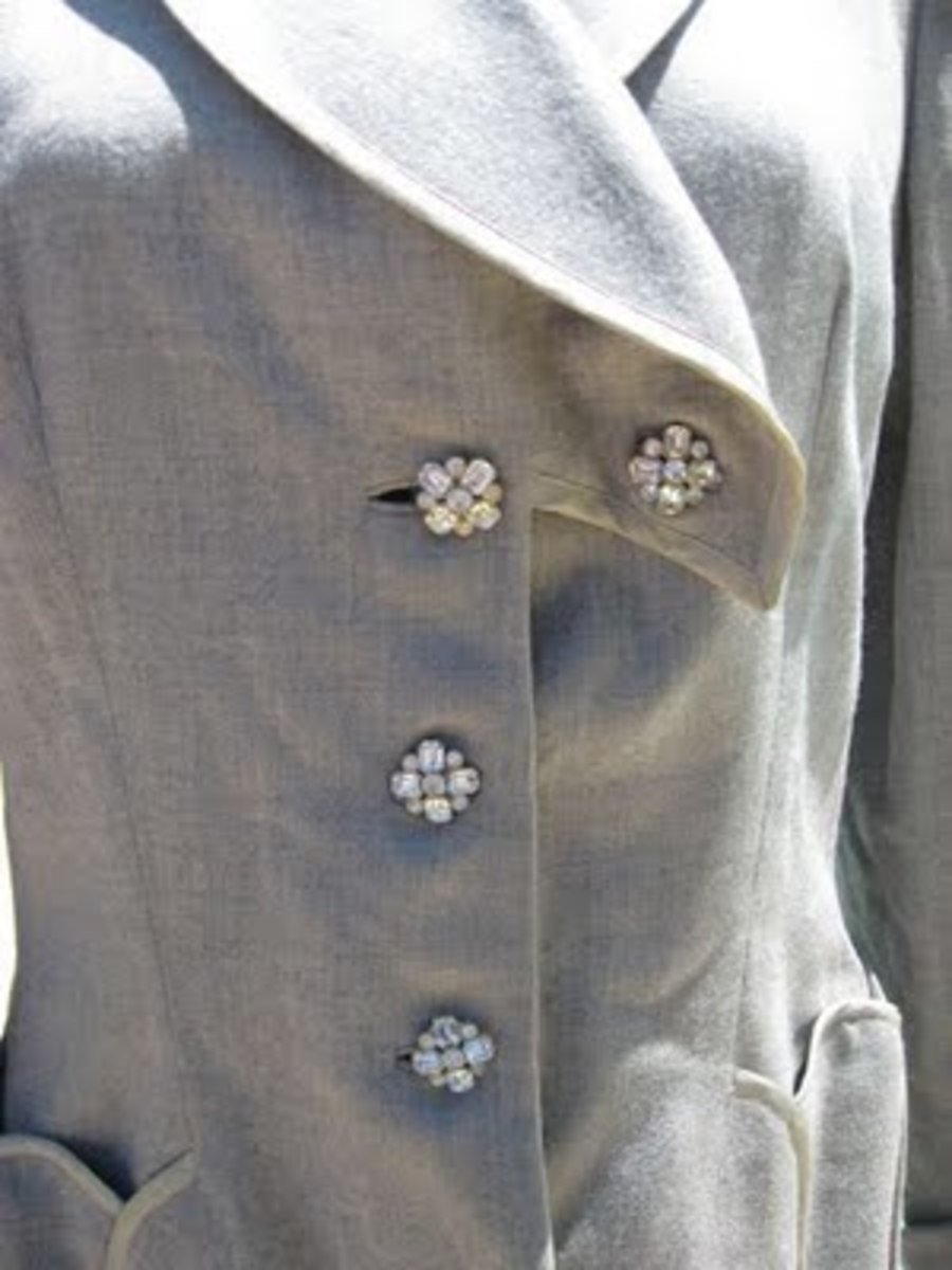 vintage 40s Lilli Ann soft grey jacket with rhinestone buttons.  See related links for more information.