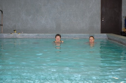 My friend Cindy and me in my clinic's heated pool