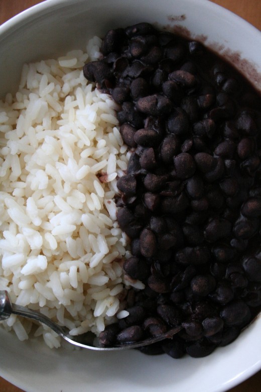 White rice and black beans: good combination for complementary protein. Brown rice is healthier, but the beans supply plenty of fiber here.