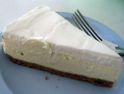 A slice of Three Cities of Spain cheesecake.